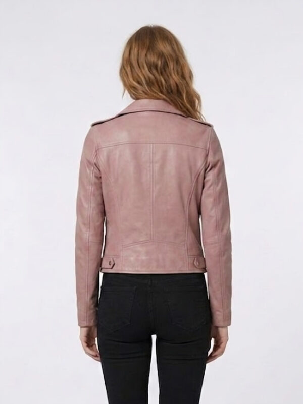 Back view of light pink women's cropped biker leather jacket showing tailored stitching