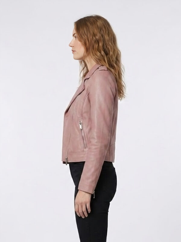 Right side profile of stylish light pink women's cropped real leather biker jacket showing sleeve details